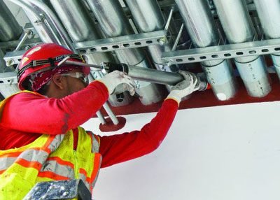 Experienced firestopping installer at work